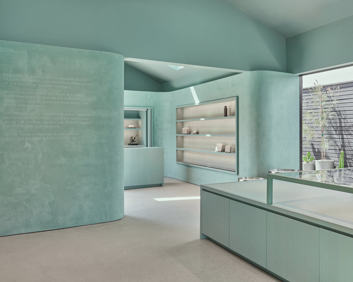 Modern interior design with light green walls and furniture