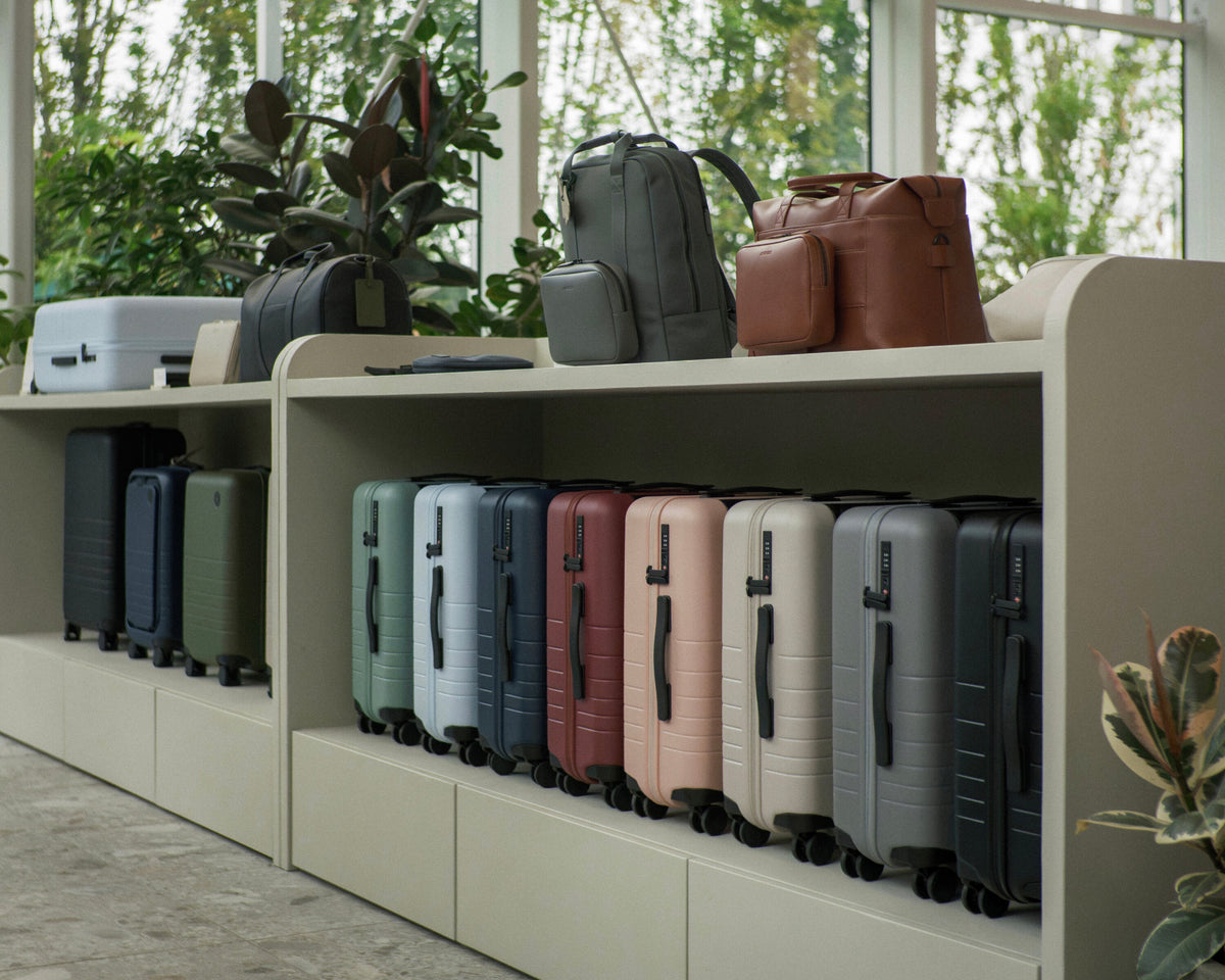 The Classic collection and Metro collection displayed on built-in shelving in a bright, modern retail space with large windows and greenery.