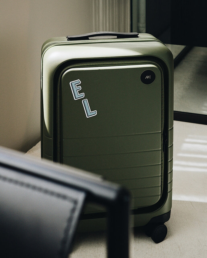 Carry-On Pro in Olive Green with E and L Alphabet Stickers on