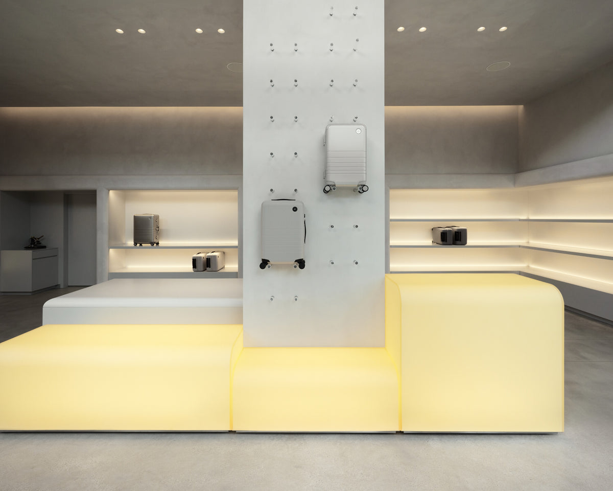 Modern interior design with yellow bench and gray walls
